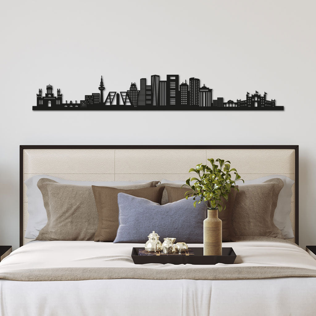 Madrid Skyline laser-cut in Matte Black reclycled acrylic on Seating Room's Wall
