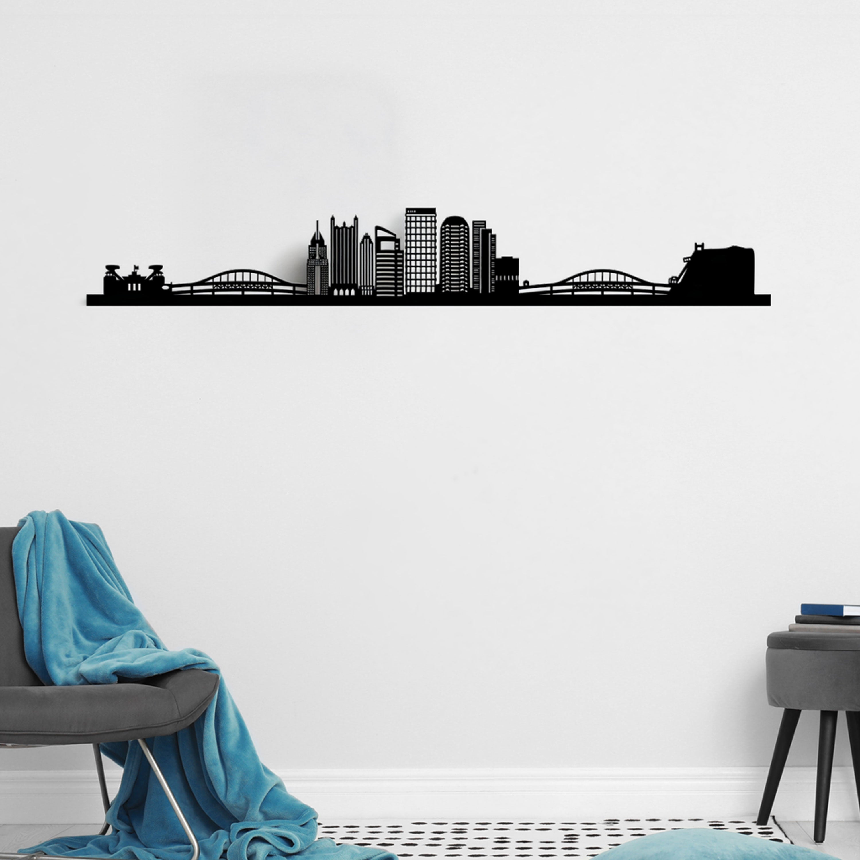Pittsburgh Skyline laser-cut in Matte Black reclycled acrylic on Seating Room's Wall